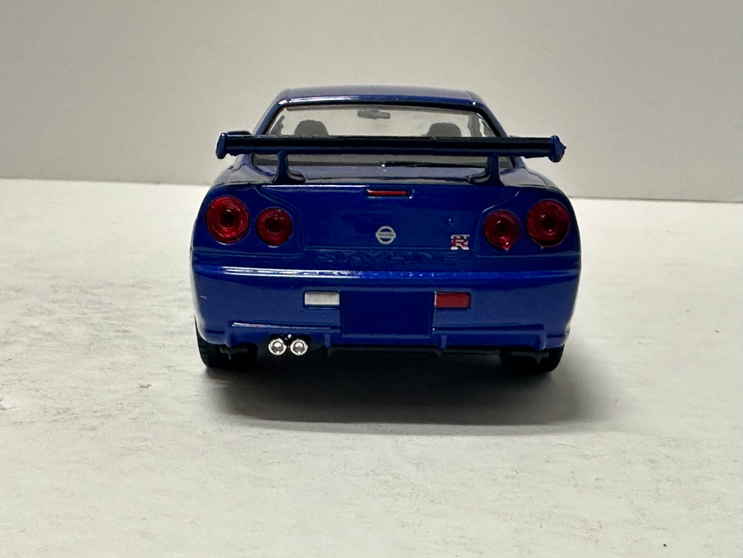 Welly 1:24 NISSAN SKYLINE GT-R (R34) RHD Blue  DIECAST 24108.BU