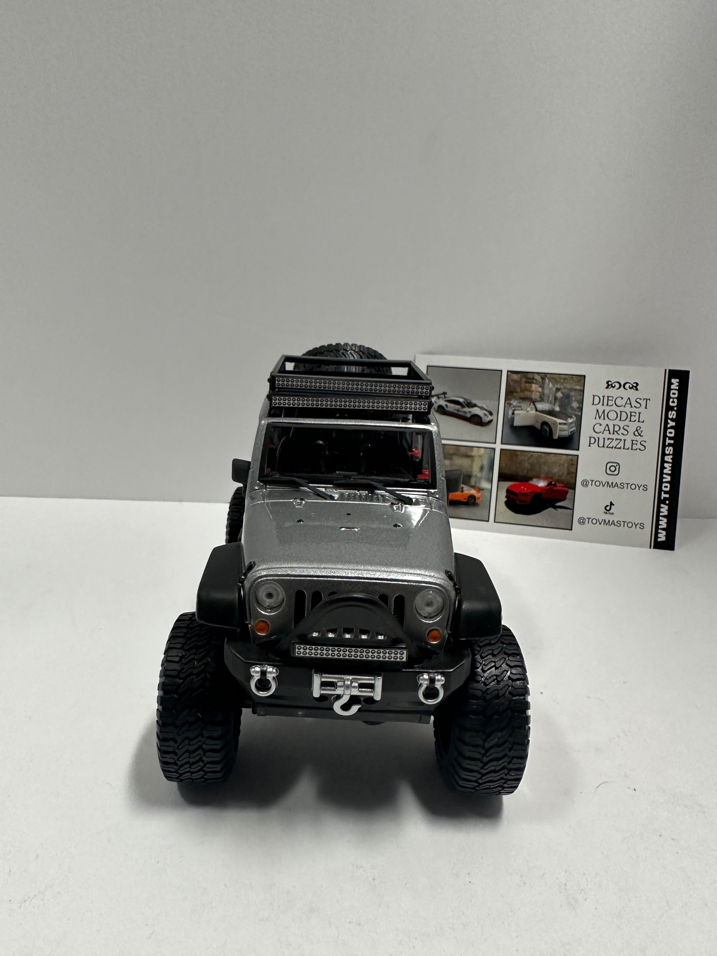 Diecast jeep discount wrangler unlimited black