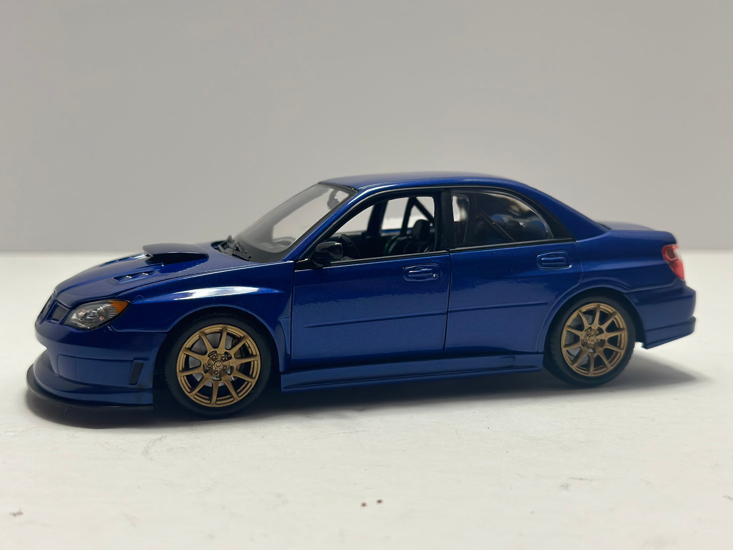 Welly 1:24 Subaru Impreza WRX STi GD Blue Diecast