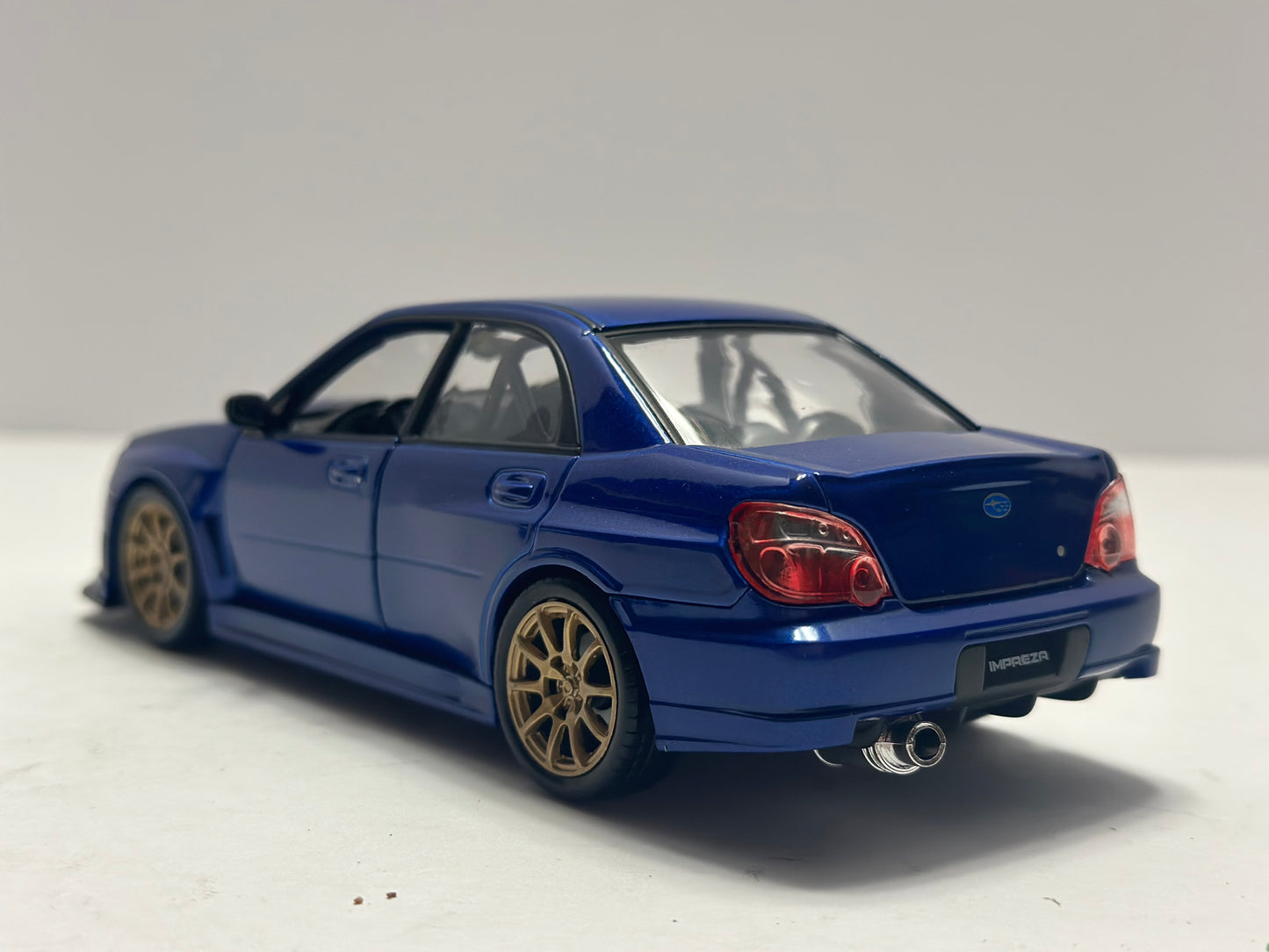 Welly 1:24 Subaru Impreza WRX STi GD Blue Diecast