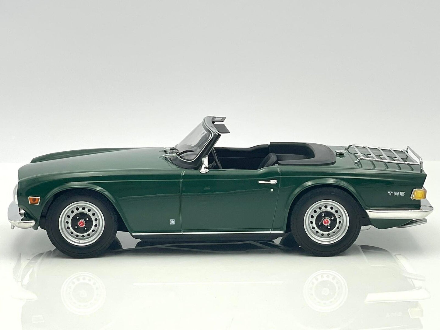 1969 Triumph TR6 LHD Dark Green Top Down in 1:18 scale by Minichamps