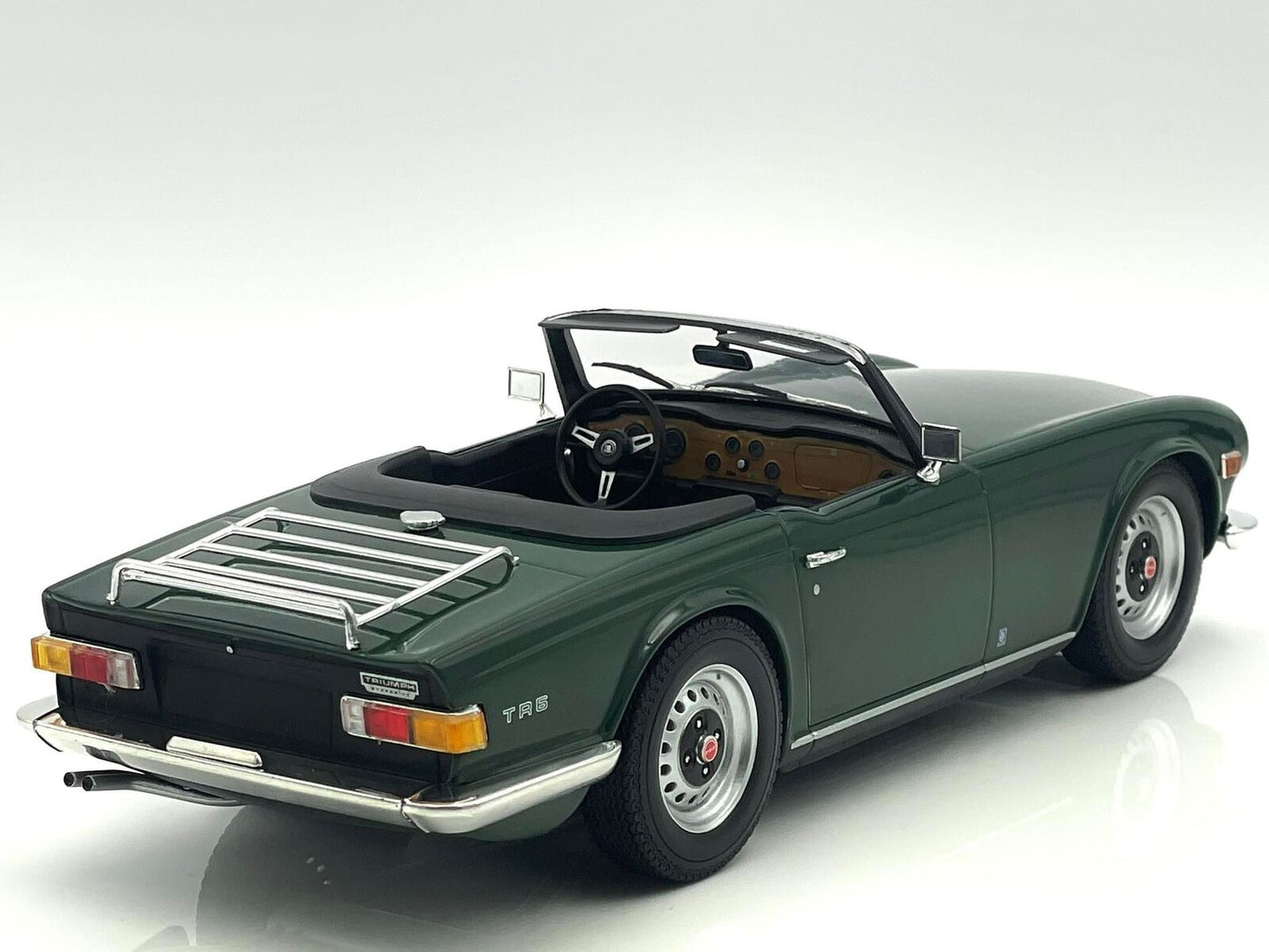 1969 Triumph TR6 LHD Dark Green Top Down in 1:18 scale by Minichamps