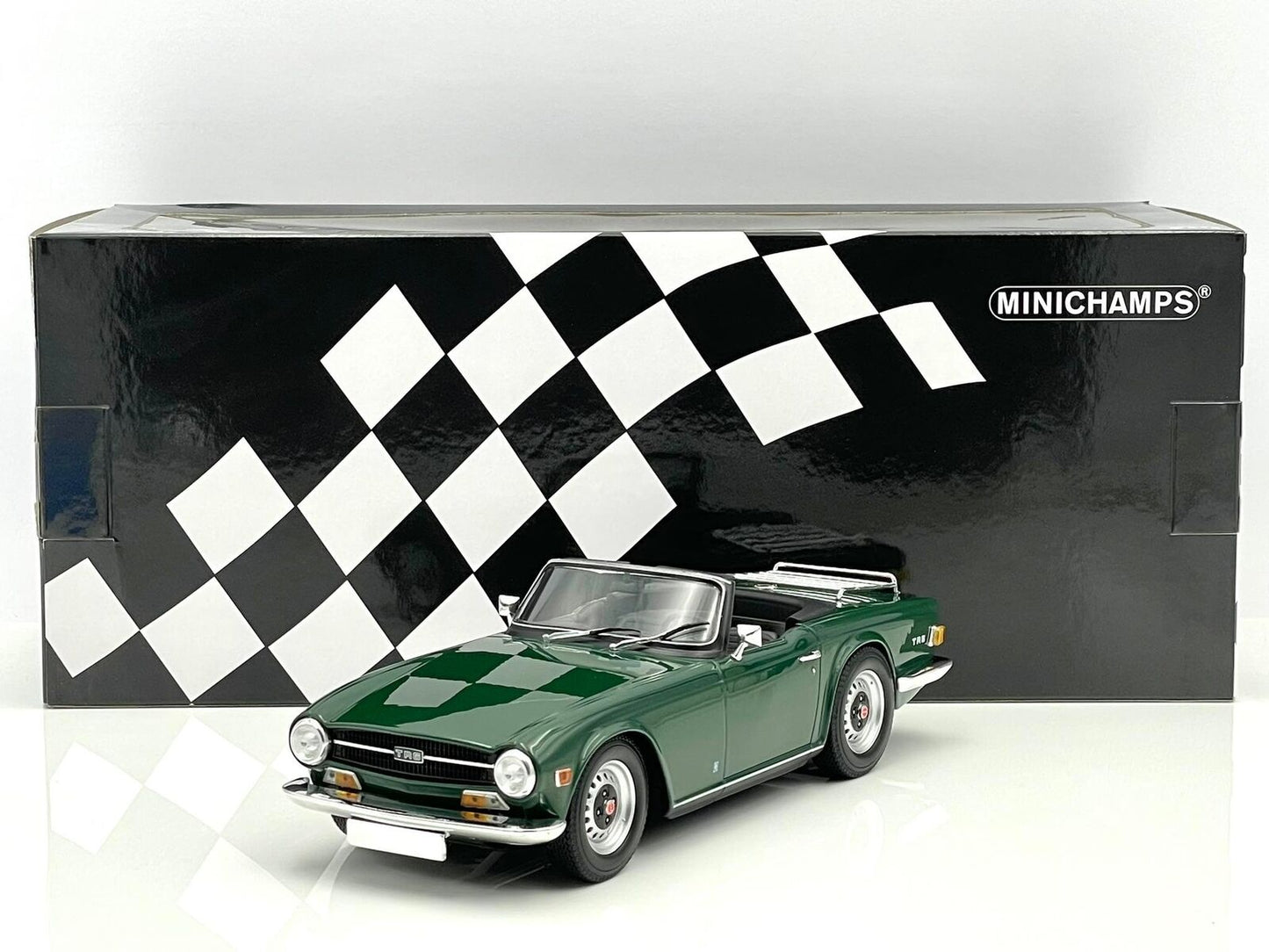 1969 Triumph TR6 LHD Dark Green Top Down in 1:18 scale by Minichamps